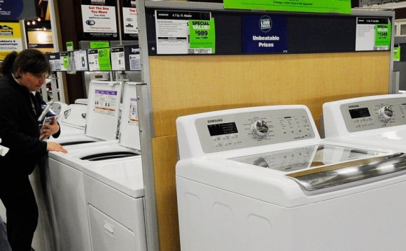 Woman shopping for a washing